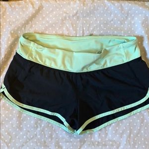 Lululemon speed shorts. Black with mint trim. 8